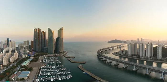 Framed Print : Busan city skyline view at Haeundae district, Gwangalli Beach with yacht pier at Busan, South Korea Framed Print : Busan city skyline view at Haeundae district, Gwangalli Beach with yacht pier at Busan, South Korea