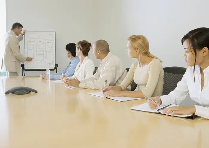 Framed Print : Businessman giving presentation in board room Framed Print : Businessman giving presentation in board room