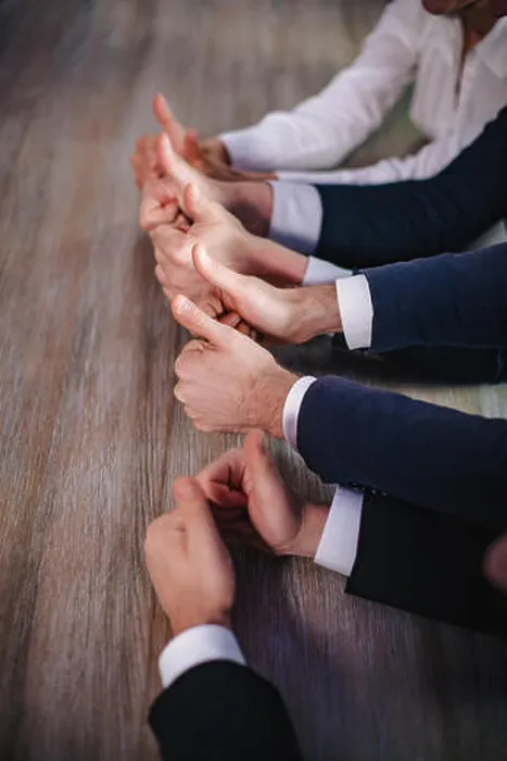Framed Print : Businessmen holding big thumbs up. Close up