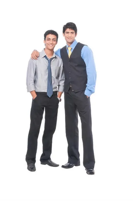 Framed Print : Two businessmen standing close, looking happy, hands on shoulder Framed Print : Two businessmen standing close, looking happy, hands on shoulder