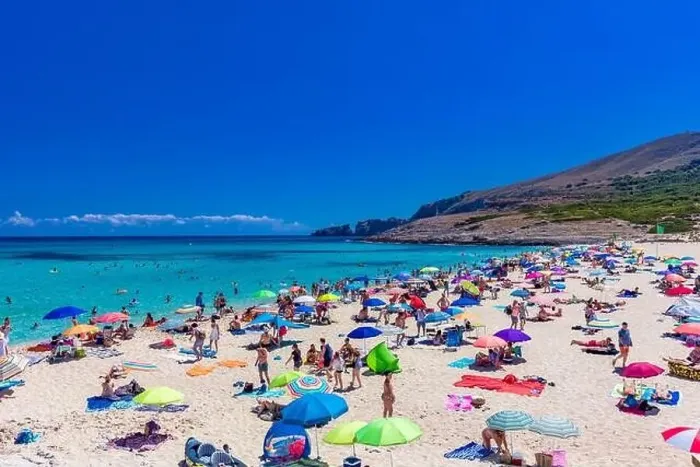 Framed Print : CALA MESQUIDA, MALLORCA, SPAIN - 19 July 2020: People enjoying beautiful sandy beach of on Mallorca Framed Print : CALA MESQUIDA, MALLORCA, SPAIN - 19 July 2020: People enjoying beautiful sandy beach of on Mallorca