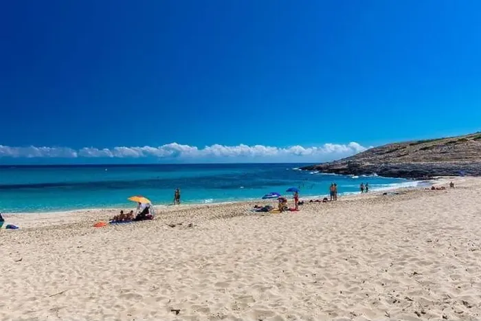 Framed Print : CALA MESQUIDA, MALLORCA, SPAIN - 19 July 2020: People enjoying beautiful sandy beach of on Mallorca Framed Print : CALA MESQUIDA, MALLORCA, SPAIN - 19 July 2020: People enjoying beautiful sandy beach of on Mallorca