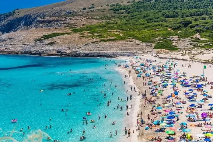 Framed Print : CALA MESQUIDA, MALLORCA, SPAIN - 19 July 2020: People enjoying beautiful sandy beach of on Mallorca Framed Print : CALA MESQUIDA, MALLORCA, SPAIN - 19 July 2020: People enjoying beautiful sandy beach of on Mallorca