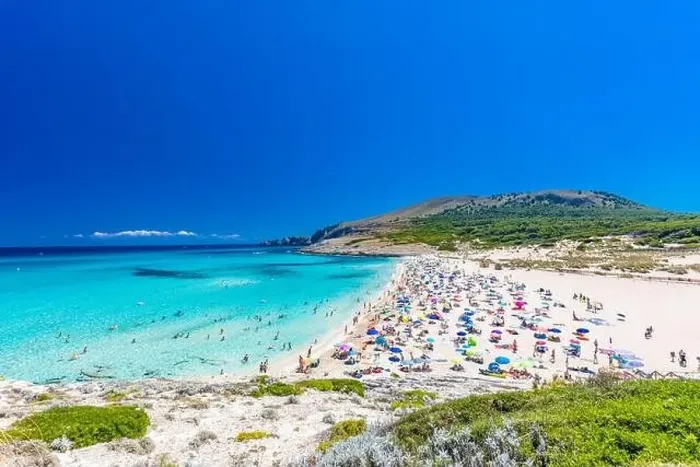 Framed Print : CALA MESQUIDA, MALLORCA, SPAIN - 19 July 2020: People enjoying beautiful sandy beach of on Mallorca Framed Print : CALA MESQUIDA, MALLORCA, SPAIN - 19 July 2020: People enjoying beautiful sandy beach of on Mallorca
