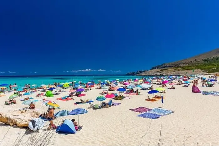 Framed Print : CALA MESQUIDA, MALLORCA, SPAIN - 19 July 2020: People enjoying beautiful sandy beach of on Mallorca Framed Print : CALA MESQUIDA, MALLORCA, SPAIN - 19 July 2020: People enjoying beautiful sandy beach of on Mallorca