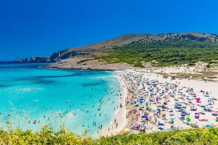 Framed Print : CALA MESQUIDA, MALLORCA, SPAIN - 19 July 2020: People enjoying beautiful sandy beach of on Mallorca Framed Print : CALA MESQUIDA, MALLORCA, SPAIN - 19 July 2020: People enjoying beautiful sandy beach of on Mallorca
