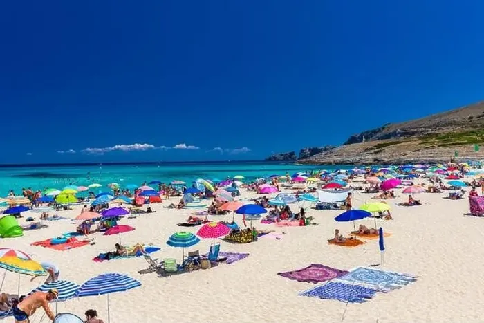 Framed Print : CALA MESQUIDA, MALLORCA, SPAIN - 19 July 2020: People enjoying beautiful sandy beach of on Mallorca Framed Print : CALA MESQUIDA, MALLORCA, SPAIN - 19 July 2020: People enjoying beautiful sandy beach of on Mallorca
