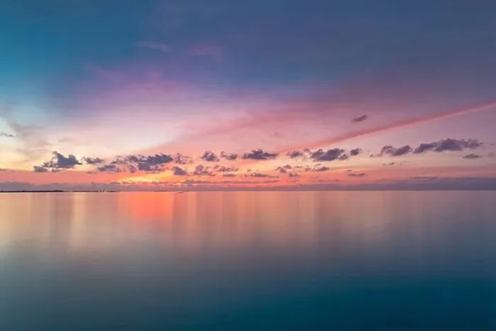 Framed Print : Calm sea with sunset sky and sun through the clouds over. Meditation ocean and sky background. Tranquil seascape. Horizon over the water Framed Print : Calm sea with sunset sky and sun through the clouds over. Meditation ocean and sky background. Tranquil seascape. Horizon over the water