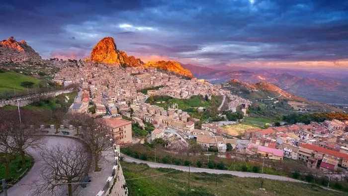 Framed Print : Caltabellotta, Sicily, Italy. Cityscape image if historic town Caltabellotta in Sicily at dramatic sunset Framed Print : Caltabellotta, Sicily, Italy. Cityscape image if historic town Caltabellotta in Sicily at dramatic sunset