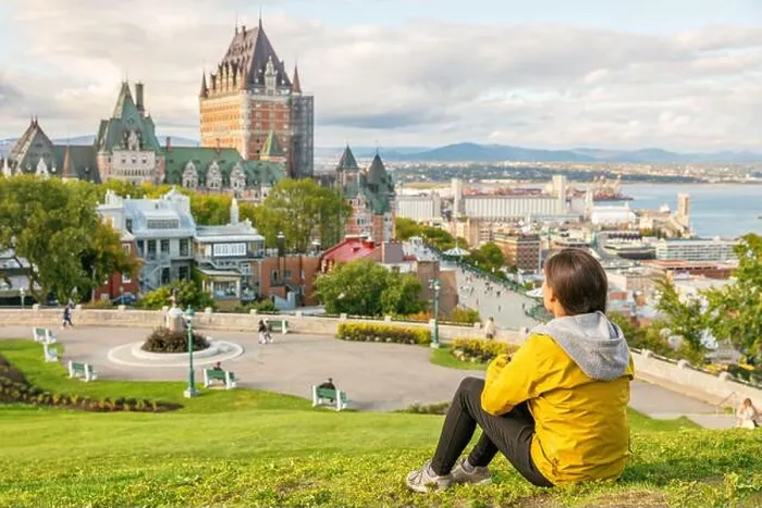 Framed Print : Canada travel Quebec city tourist enjoying view of Chateau Frontenac castle and St Framed Print : Canada travel Quebec city tourist enjoying view of Chateau Frontenac castle and St