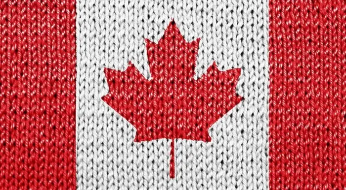 Framed Print : Canadian national flag blended on white knitted background Framed Print : Canadian national flag blended on white knitted background