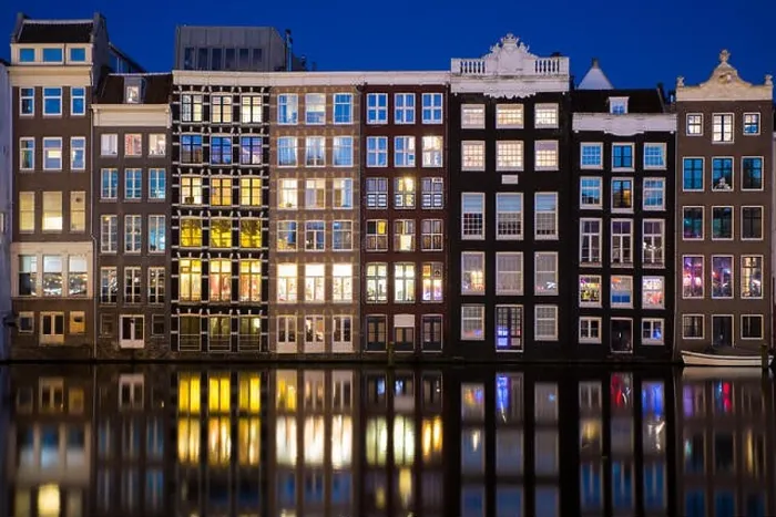 Framed Print : Canals of Amsterdam at night. Amsterdam is the capital and most populous city of the Netherlands Framed Print : Canals of Amsterdam at night. Amsterdam is the capital and most populous city of the Netherlands