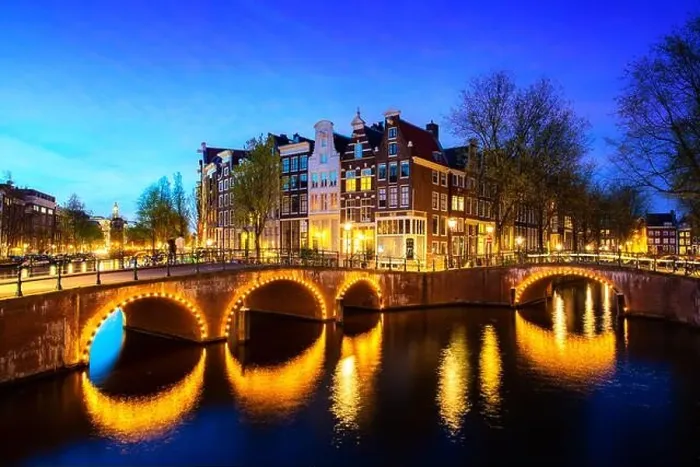 Framed Print : Canals of Amsterdam during twilight in Netherlands. Amsterdam is the capital and most populous city of the Netherlands. Landscape and culture travel Framed Print : Canals of Amsterdam during twilight in Netherlands. Amsterdam is the capital and most populous city of the Netherlands. Landscape and culture travel