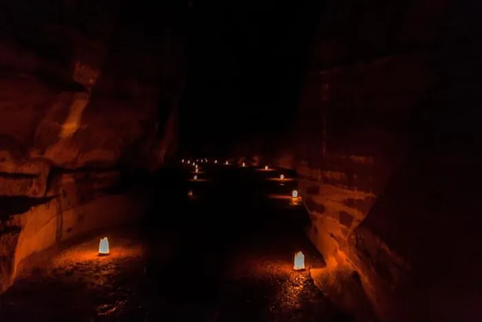 Framed Print : Candels along the Siq narrow gorge, main entrance to the ancient city Petra during Petra by Night, Jordan