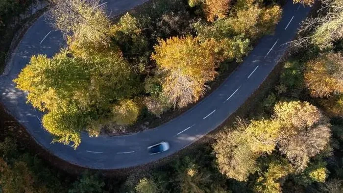 Framed Print : Car driving on a mountain road surrounded by fall season forest. Aerial photography Framed Print : Car driving on a mountain road surrounded by fall season forest. Aerial photography