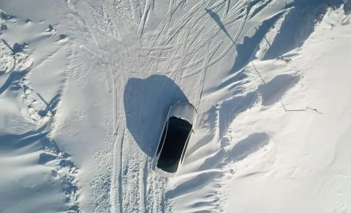 Framed Print : One car parked at snow field above top view fron drone. Travel on car theme Framed Print : One car parked at snow field above top view fron drone. Travel on car theme