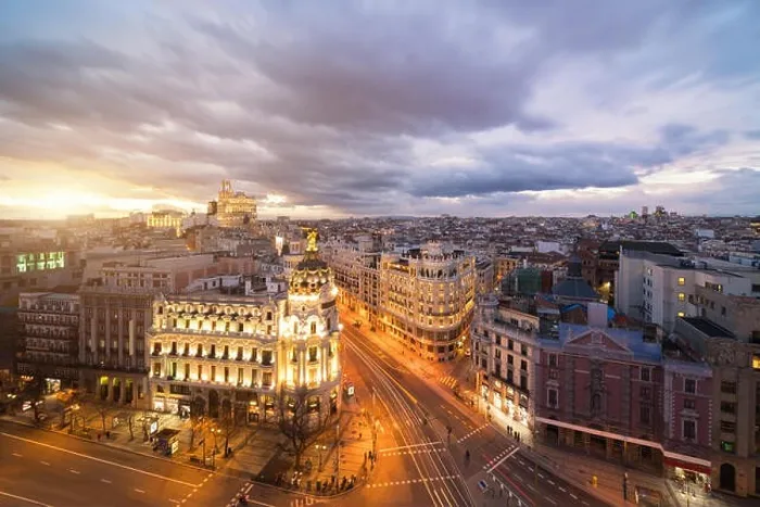 Framed Print : Car and traffic lights on Gran via street, main shopping street in Madrid at night. Spain, Europe. Lanmark in Madrid, Spain Framed Print : Car and traffic lights on Gran via street, main shopping street in Madrid at night. Spain, Europe. Lanmark in Madrid, Spain