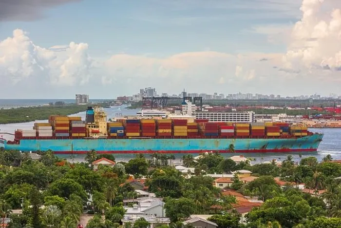 Framed Print : A cargo ship passes through the rivers of Ft. Lauderdale, Florida, USA Framed Print : A cargo ship passes through the rivers of Ft. Lauderdale, Florida, USA