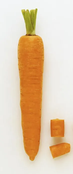 Framed Print : A whole Carrot and two pieces next to it Framed Print : A whole Carrot and two pieces next to it