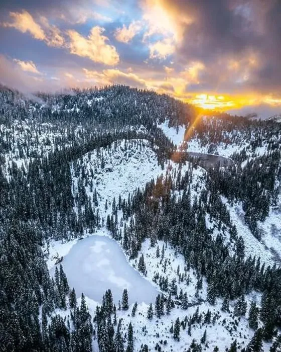 Framed Print : The Cascade Range in Washington State dusted with fresh snow captured by drone with orange clouds in the sky Framed Print : The Cascade Range in Washington State dusted with fresh snow captured by drone with orange clouds in the sky