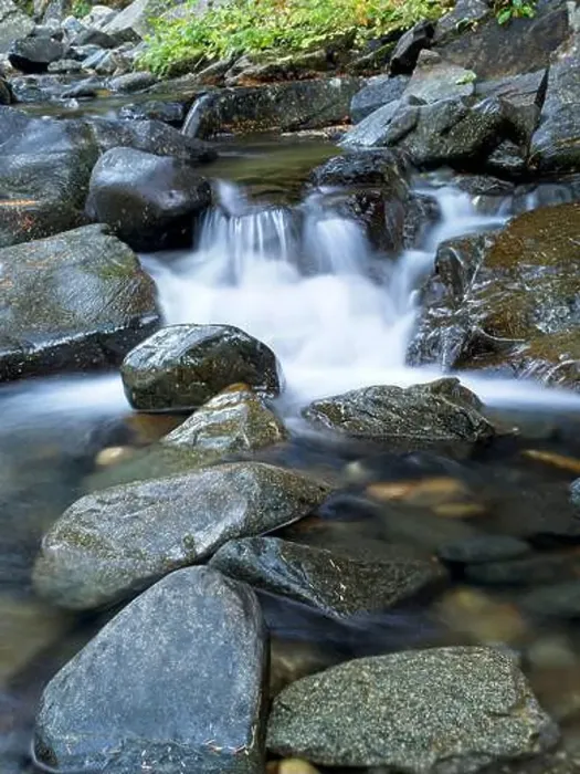 Framed Print : The cascading water of Lightning Creek located in north Idaho