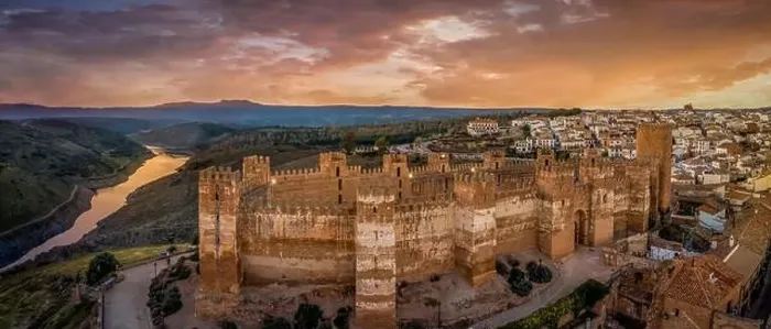 Framed Print : Castillo de Bury Al-Hammam in Banos de la Encina La Mancha province Spain old medieval castle with 14 towers from