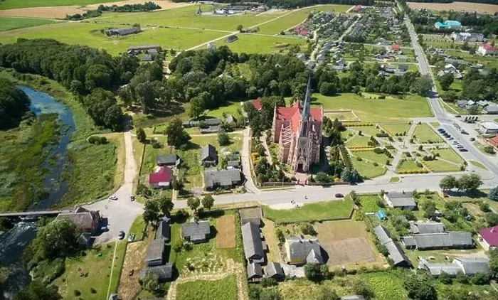 Framed Print : Catholic cathedral in small town aerial drone view Framed Print : Catholic cathedral in small town aerial drone view