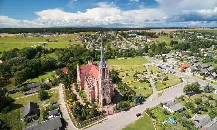 Framed Print : Catholic historical cathedral in small town aerial drone view Framed Print : Catholic historical cathedral in small town aerial drone view
