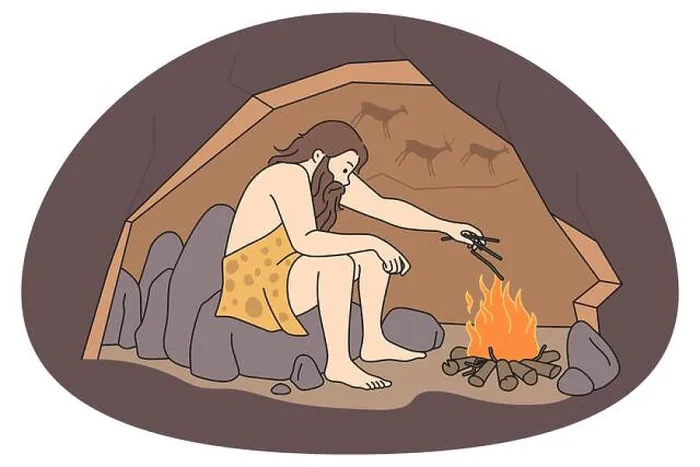 Framed Print : Caveman sitting in cave near bonfire warming Framed Print : Caveman sitting in cave near bonfire warming