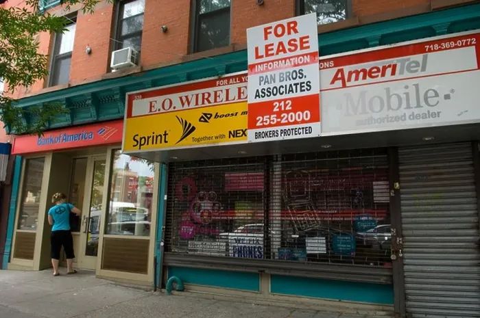 Framed Print : Cellphone store for lease in Park Slope Brooklyn New York on Saturday 13 2009 Frances M Roberts