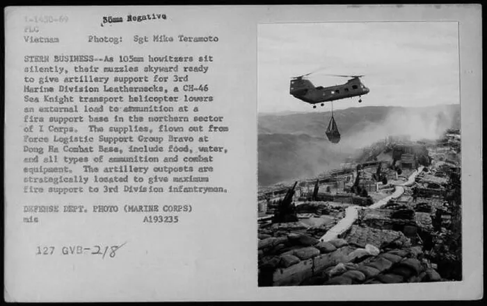 Framed Print : A CH-46 Sea Knight transport helicopter lowers external supplies Framed Print : A CH-46 Sea Knight transport helicopter lowers external supplies