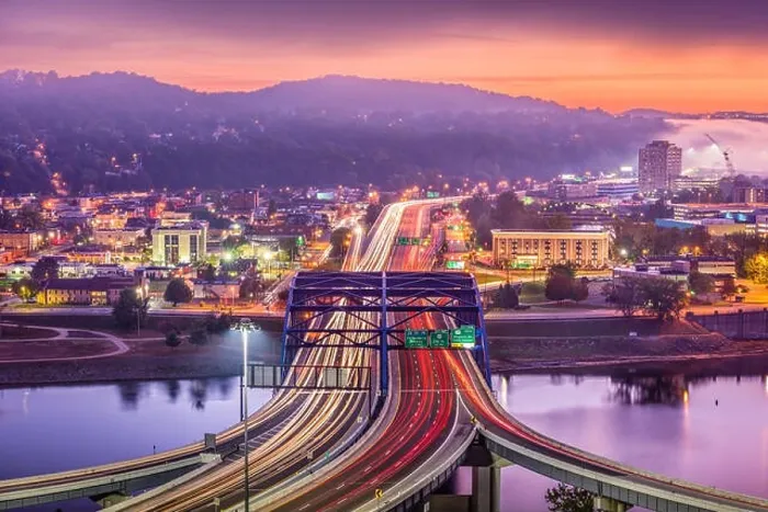 Framed Print : Charleston, West Virginia, USA downtown skyline over the interstate and the river Framed Print : Charleston, West Virginia, USA downtown skyline over the interstate and the river
