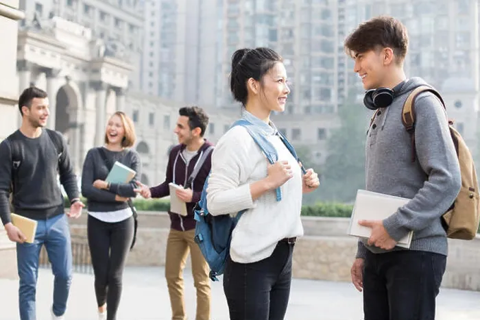 Framed Print : Cheerful abroad students talking on campus Framed Print : Cheerful abroad students talking on campus