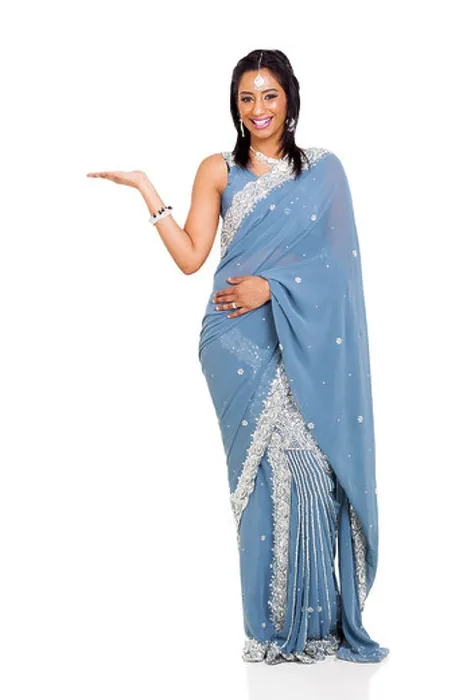 Framed Print : cheerful Indian woman wearing sari presenting isolated on white Framed Print : cheerful Indian woman wearing sari presenting isolated on white
