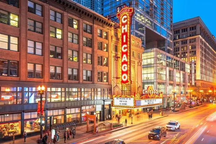 Framed Print : CHICAGO, ILLINOIS - MAY 10, 2018: The landmark Chicago Theatre on State Street at twilight. The historic theater dates from 1921 Framed Print : CHICAGO, ILLINOIS - MAY 10, 2018: The landmark Chicago Theatre on State Street at twilight. The historic theater dates from 1921