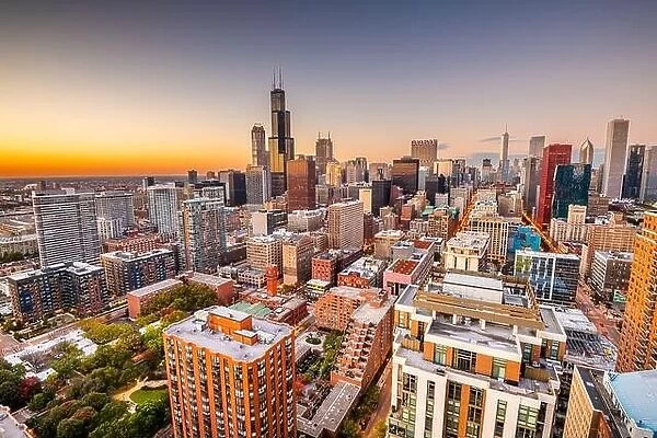Chicago, Illinois, USA aerial cityscape towards Lake Michigan at dusk