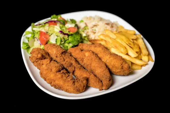 Framed Print : Chicken Goujons served with rice, salad and french friends on plate Framed Print : Chicken Goujons served with rice, salad and french friends on plate