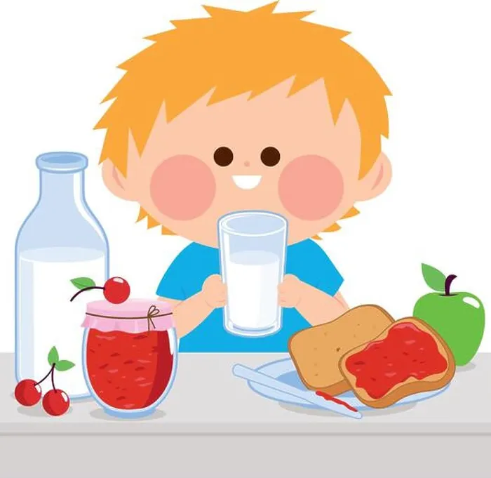 Framed Print : Child eating at home in the kitchen Framed Print : Child eating at home in the kitchen