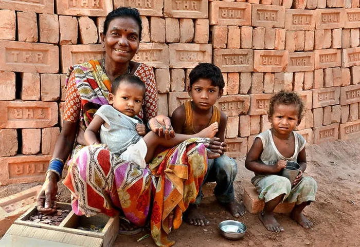 Framed Print : My children - The brick area worker awating with her children for some food in remote area of West Bengal Framed Print : My children - The brick area worker awating with her children for some food in remote area of West Bengal