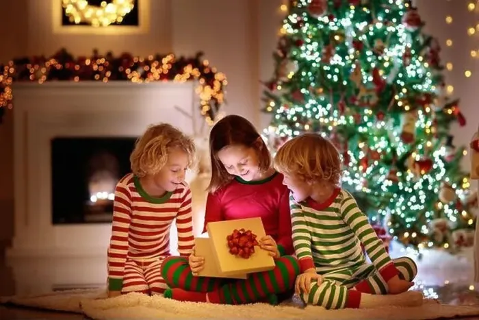Framed Print : Children at Christmas tree and fireplace on Xmas eve Framed Print : Children at Christmas tree and fireplace on Xmas eve