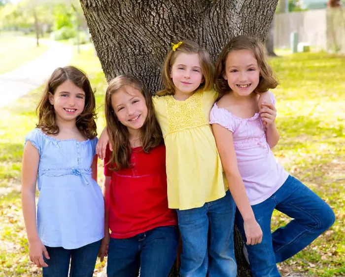 Framed Print : Children group friend girls playing on tree Framed Print : Children group friend girls playing on tree