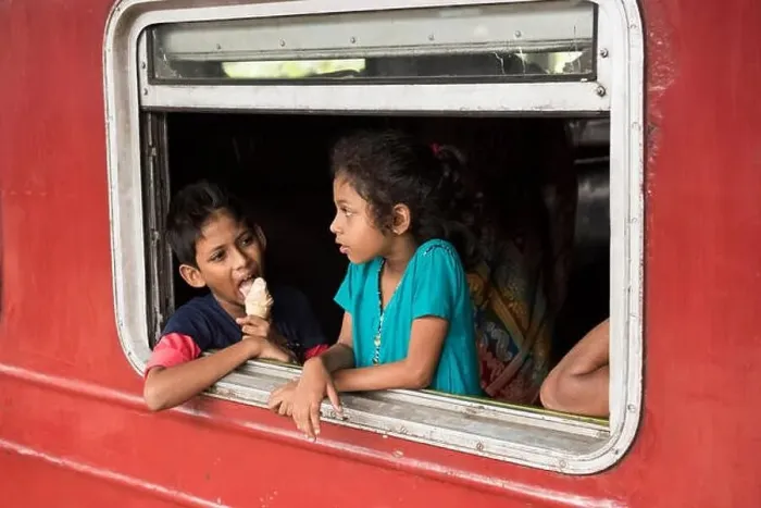 Framed Print : Children looking out of the window of train carriage, Kandy Railway Station, Kande, Sri Lanka Framed Print : Children looking out of the window of train carriage, Kandy Railway Station, Kande, Sri Lanka