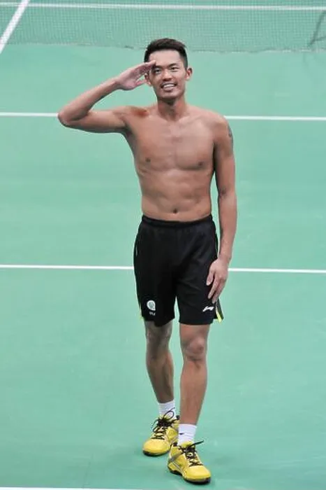 Framed Print : Chinese badminton player Lin Dan salutes after he wins the championship for the Mens Singles tournament of the 2013 BWF Framed Print : Chinese badminton player Lin Dan salutes after he wins the championship for the Mens Singles tournament of the 2013 BWF