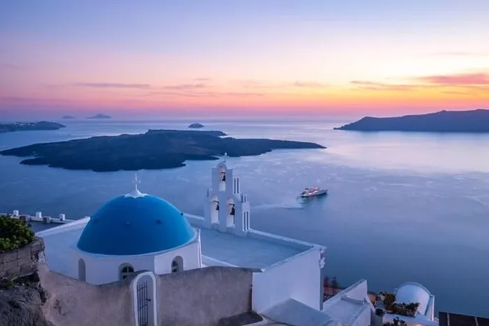Framed Print : Church St. Spirou in Firostefani. Amazing evening view caldera, volcano of Santorini, Greece with cruise ships sunset sky. Famous travel destination Framed Print : Church St. Spirou in Firostefani. Amazing evening view caldera, volcano of Santorini, Greece with cruise ships sunset sky. Famous travel destination
