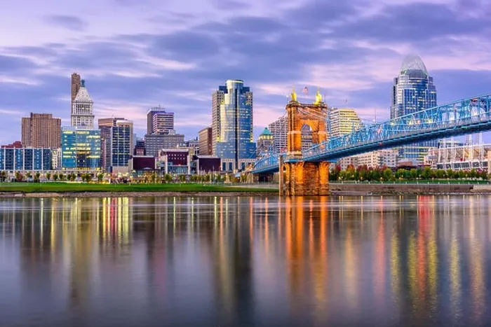 Framed Print : Cincinnati, Ohio, USA downtown skyline and bridge on the river at dusk Framed Print : Cincinnati, Ohio, USA downtown skyline and bridge on the river at dusk