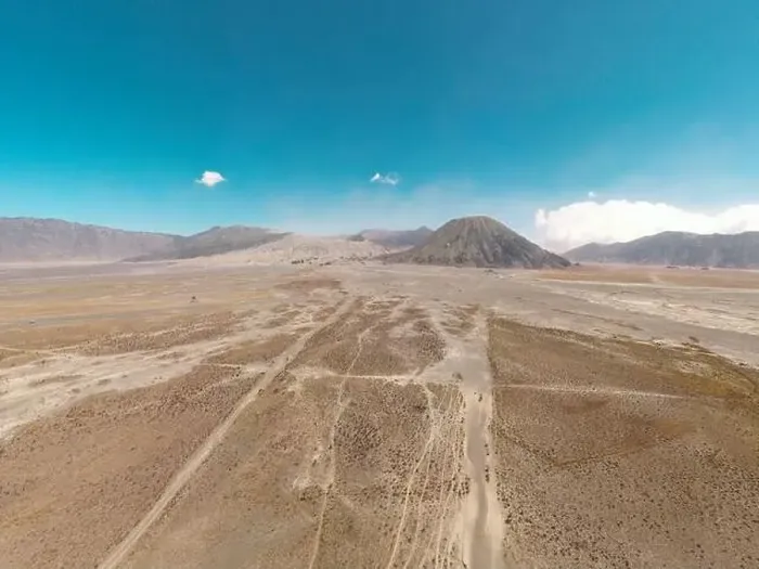 Framed Print : Cinematic shot aerial view of beautiful Mount Bromo volcano with desert in East Java Framed Print : Cinematic shot aerial view of beautiful Mount Bromo volcano with desert in East Java