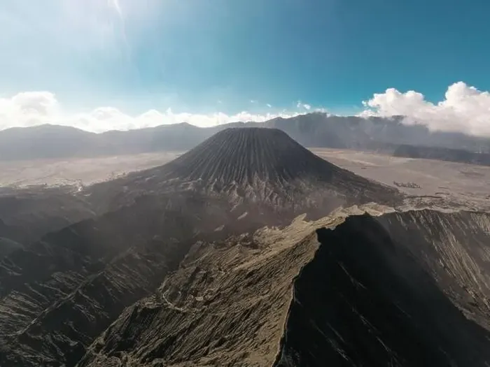 Framed Print : Cinematic shot aerial view of beautiful Mount Bromo volcano peak with desert in East Java Framed Print : Cinematic shot aerial view of beautiful Mount Bromo volcano peak with desert in East Java