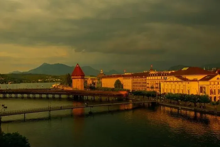 Framed Print : City of Lucerne with Chapel Bridge in a Sunny Day with Overcast Clouds in Switzerland Framed Print : City of Lucerne with Chapel Bridge in a Sunny Day with Overcast Clouds in Switzerland