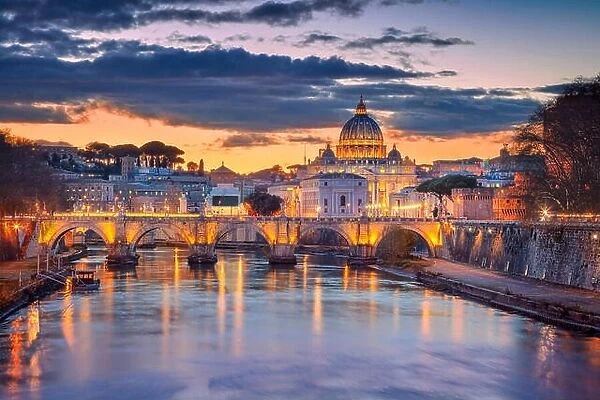 Cityscape image of Rome and Vatican City with the Saint Peter Basilica during beautiful sunset