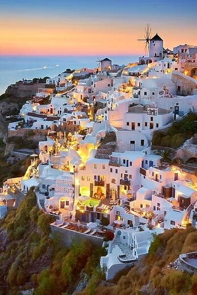 Cityscape sunset view of Oia Town, Santorini Island, Cyclades, Greece